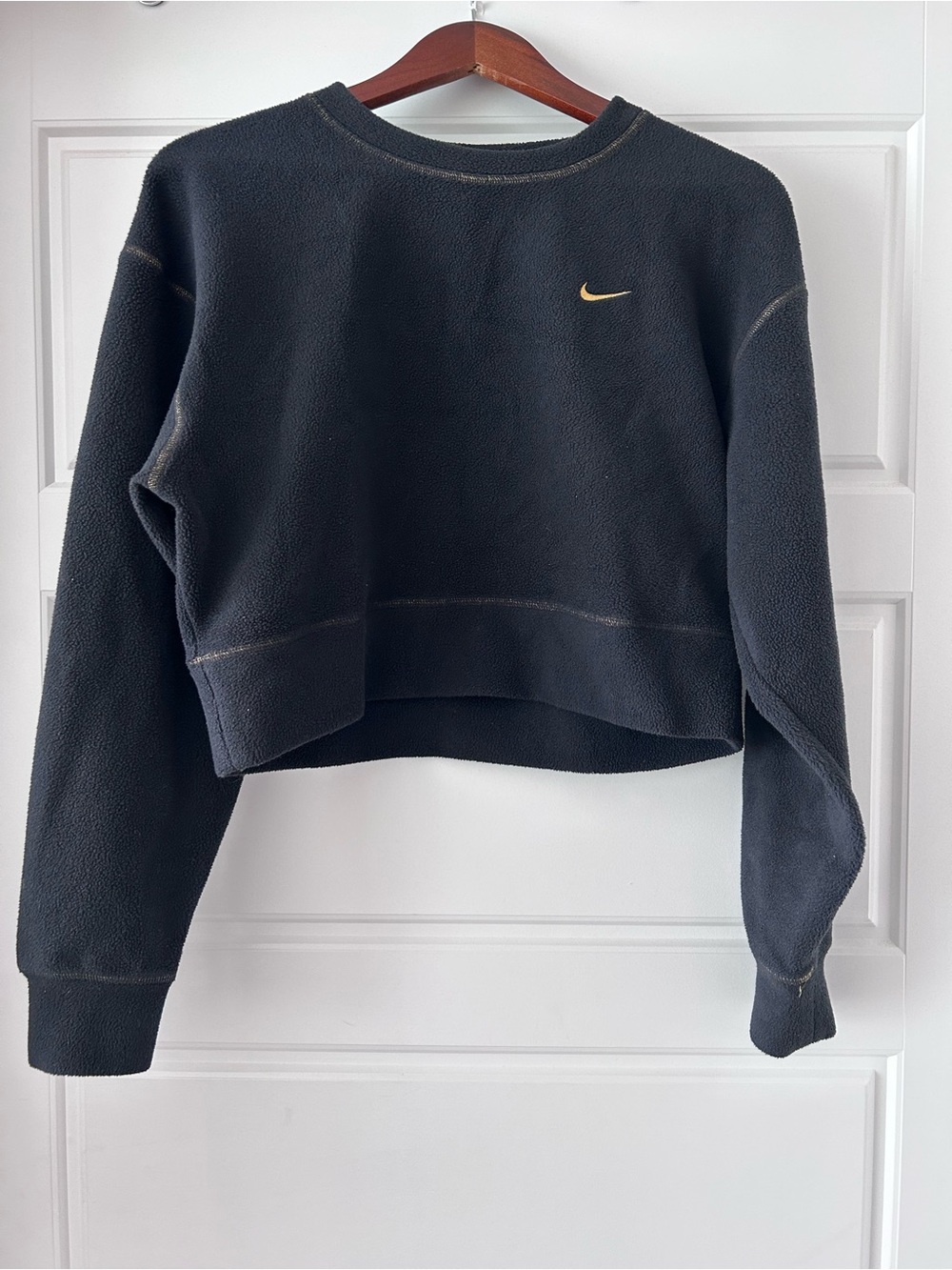 Nike Black Cropped Fleece Sweatshirt with Gold Swoosh